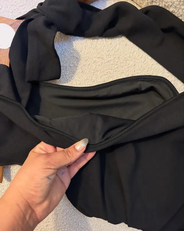 A Black One-Shoulder Halter-Neck Dress with a Bow Pleated and Fitted Short Dress Perfect for Everyday Outings and Attracting Attention a Sexy Little Black Dress for Dates