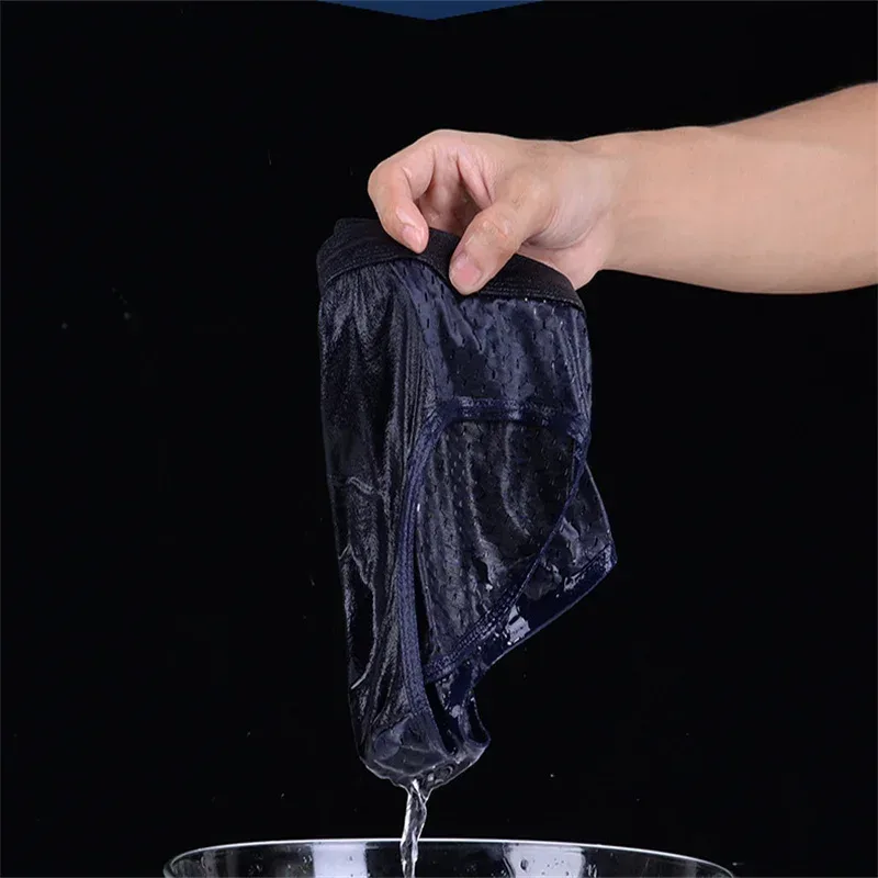 Calzoncillos de seda de hielo para hombre, ropa interior transpirable, fibra de carbono de bambú, ropa interior hueca cómoda antibacteriana, pantalones fríos