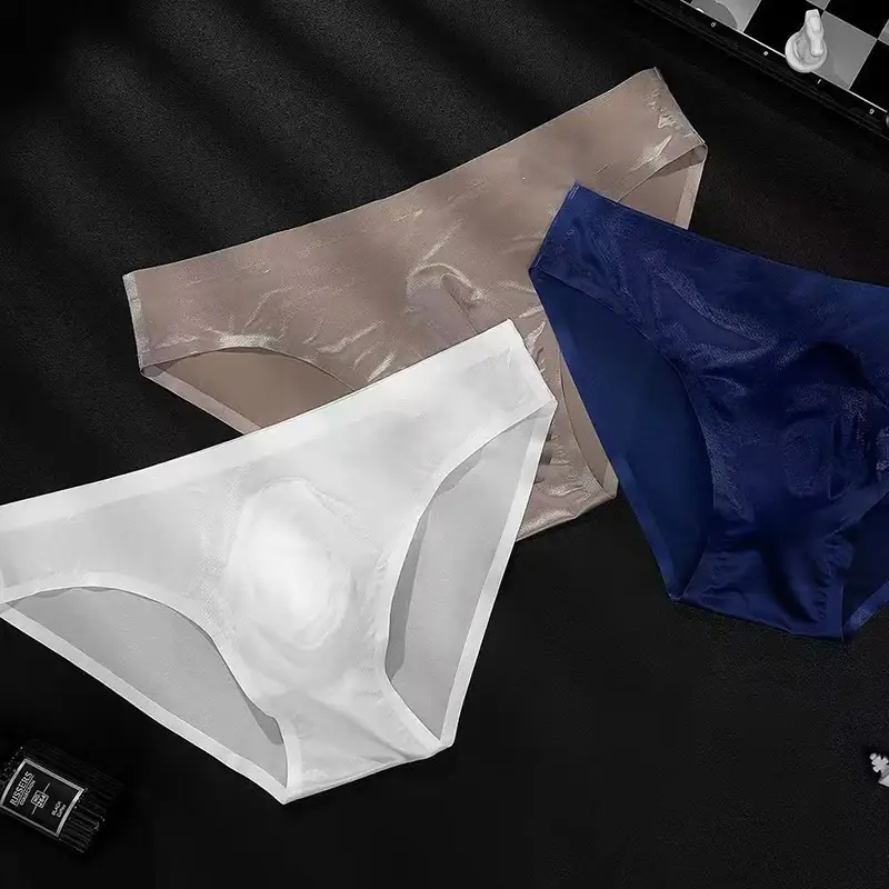 Slip da uomo in seta di ghiaccio Mutandine sexy senza cuciture ultrasottili Asciugatura rapida U Custodia rigonfia Biancheria intima traspirante Mutande lucide di lusso — image 2