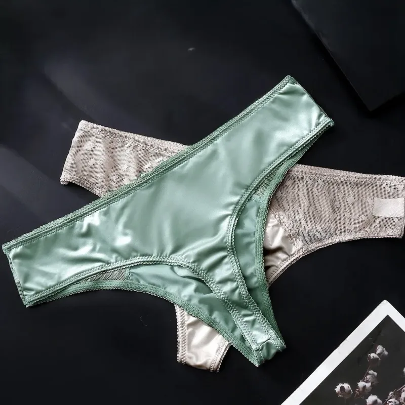Men's Thong Underwear Made of 81.7% Polyester 18.3% Spandex Ice Silk Blend with Lace Trim and 3D Bulge Pouch Solid G String