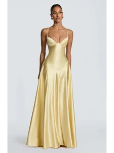 Femmes jaune coupe basse dos nu taille haute Robe à lacets sans manches taille Cincher Spaghetti sangle robes fête Club femmes Robe